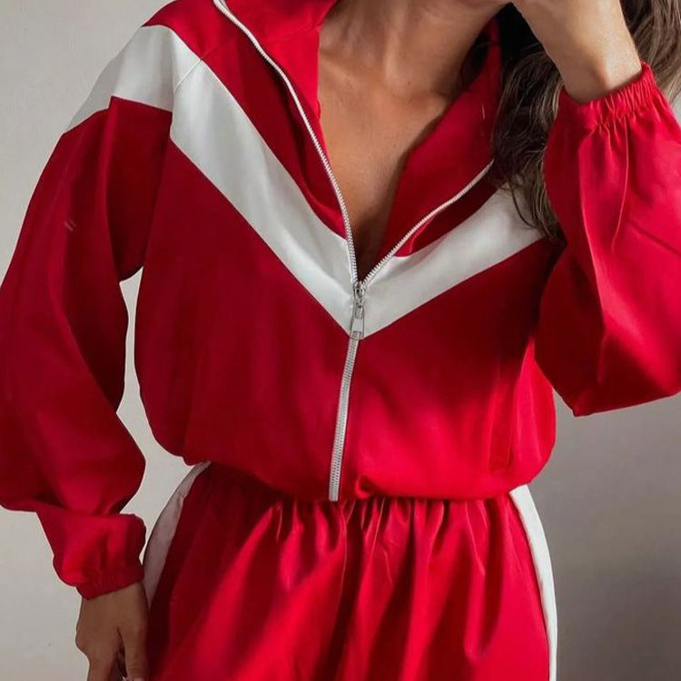 Damen eleganter sportlicher Zweiteiler Trainingsanzug mit Reißverschluss und kontrastierender V-Passe Nord Taschen