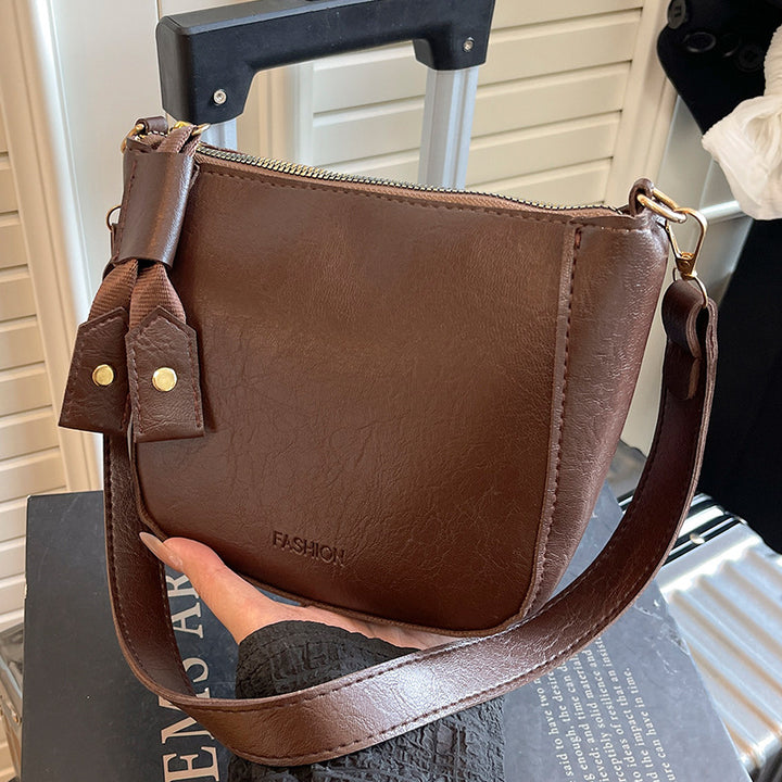 Damen Umhängetasche mit elegantem Obermaterial in hochwertiger Lederoptik Nord Taschen