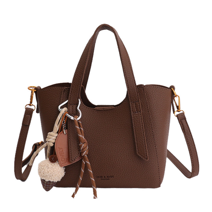 Damen Mini-Handtasche im eleganten Design mit charmantem Anhänger Nord Taschen