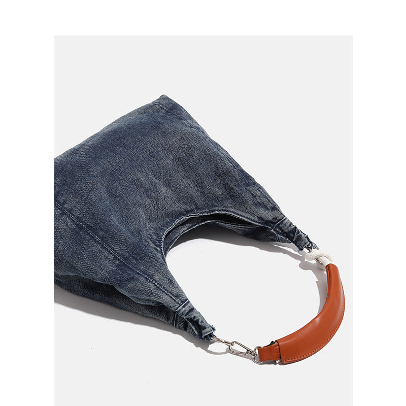 Damen Hobo-Tasche aus hochwertigem Denim mit eleganten Ledergriffen Nord Taschen