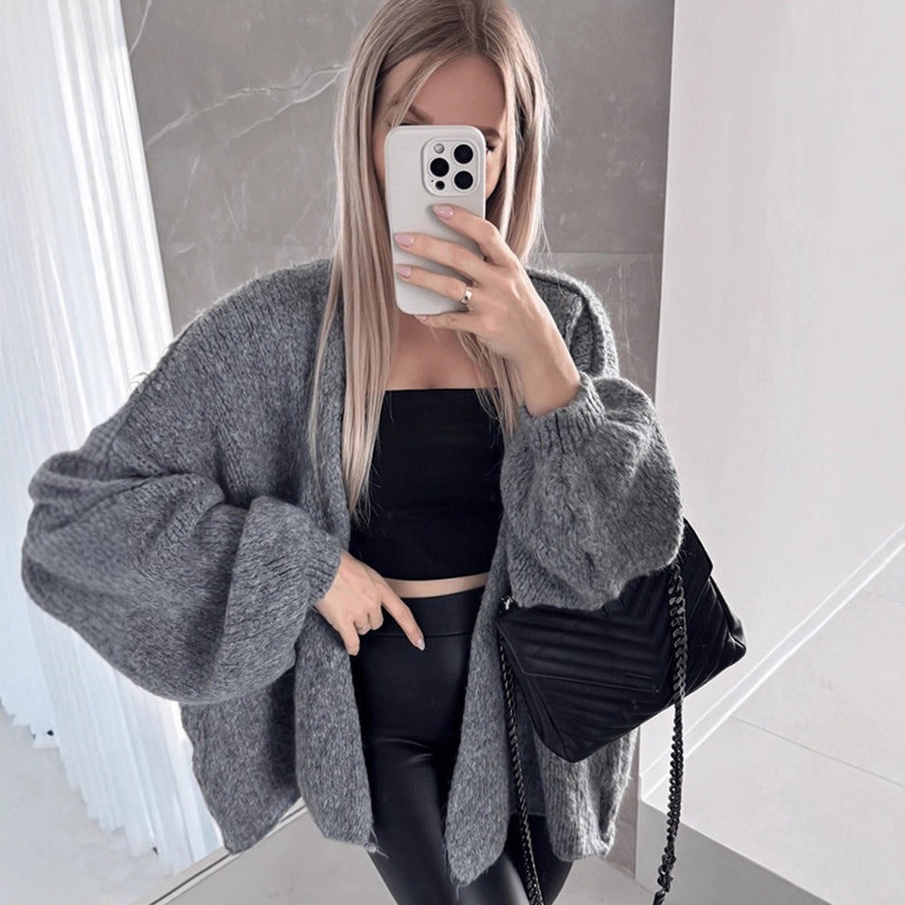 Damen Oversize Strickcardigan mit voluminösen Ballonärmeln und teddyähnlicher Struktur Nord Taschen