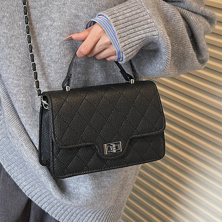 Damen Handtasche mit eleganter Steppung und schickem Metallverschluss Nord Taschen