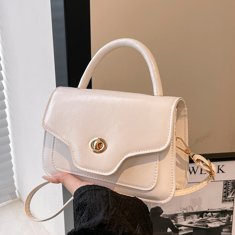 Damen Handtasche mit hochwertigem Kunstleder und elegantem Klappenverschluss Nord Taschen