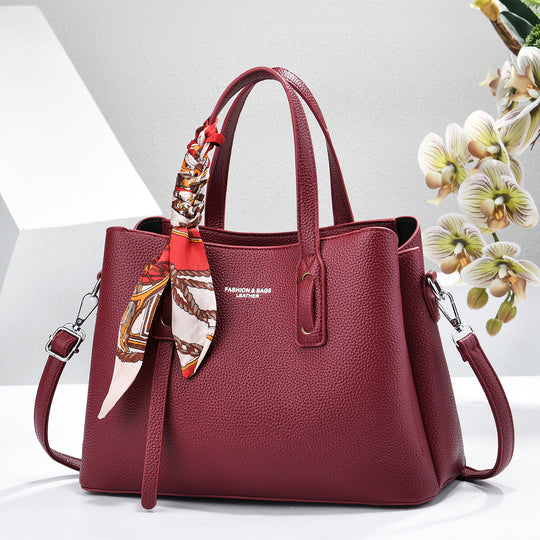Damen elegante Handtasche mit dekorativem Schal Nord Taschen