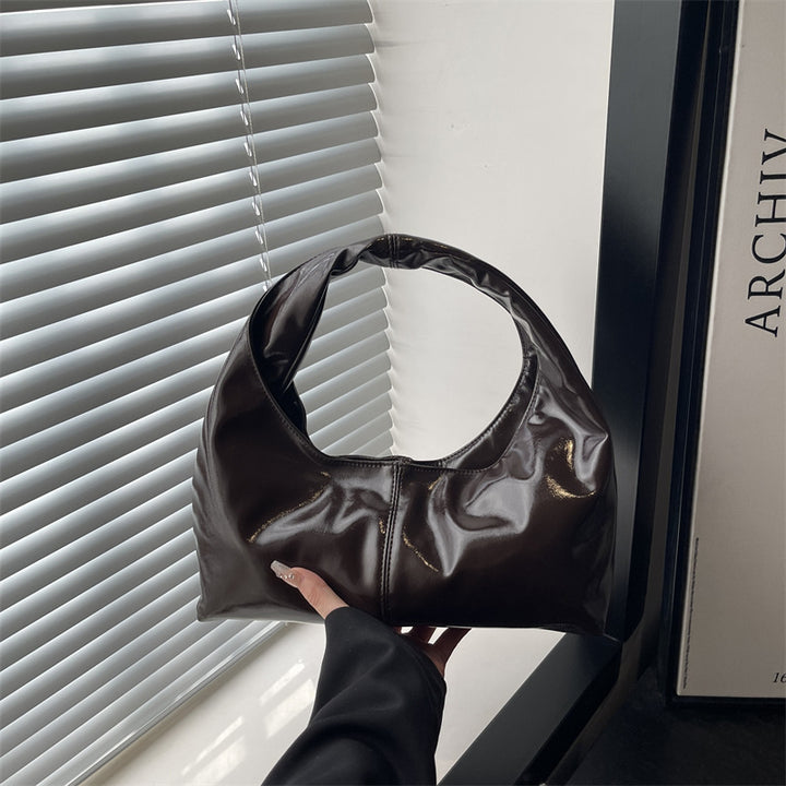 Damen Hobo-Tasche aus glänzendem Kunstleder mit elegantem Tragegriff Nord Taschen