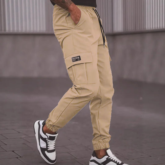 Herren Utility-Cargohose im Joggerstil mit Tunnelzugbund elastischen Beinabschlüssen und Multifachtaschen Nord Taschen