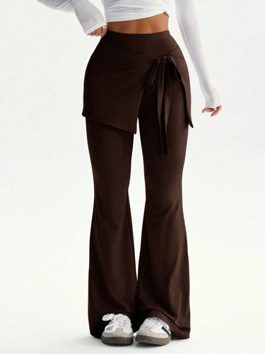 Damen hochtaillierte Schlaghose mit Wickelrock-Overlay und Taillenschleife Nord Taschen