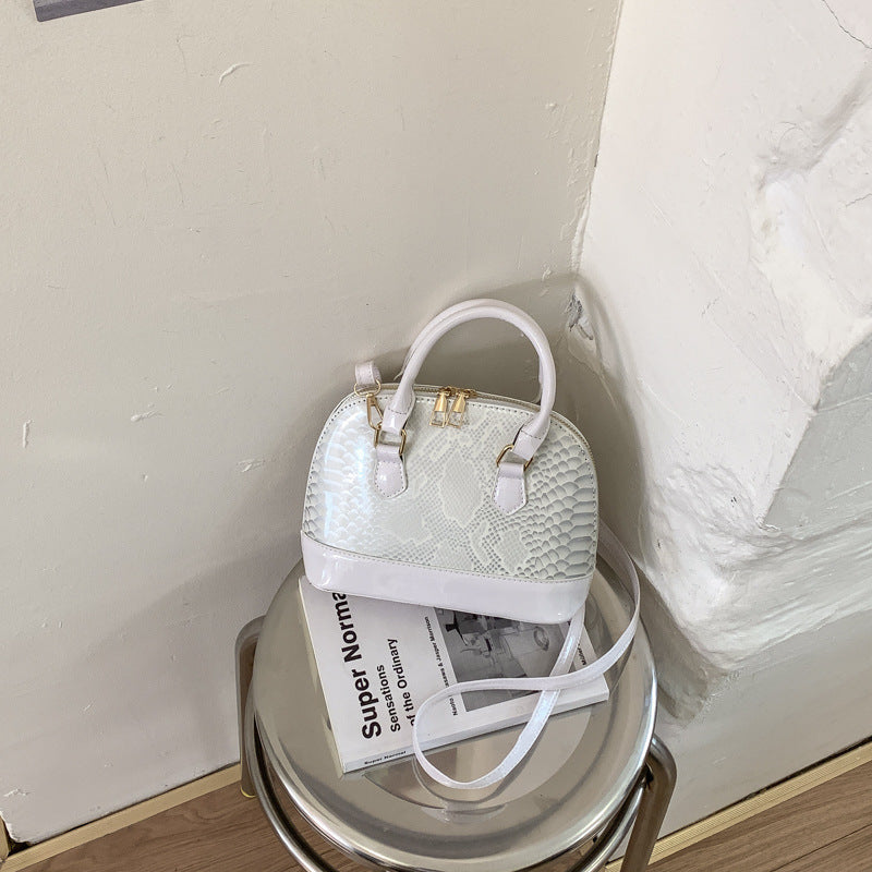 Damen elegante Handtasche im stilvollen Schlangenleder-Look Nord Taschen