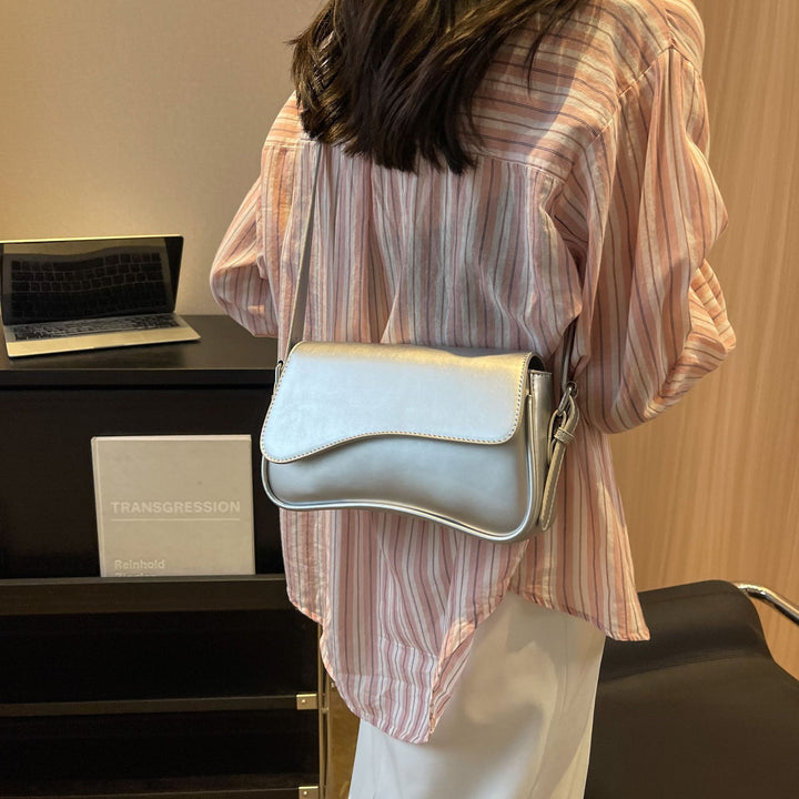 Damen Crossbody Umhängetasche mit elegantem Wellenmuster Nord Taschen