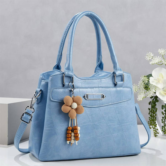 Damen Handtasche mit stilvollem Kroko-Design und abnehmbarem Blumenanhänger Nord Taschen