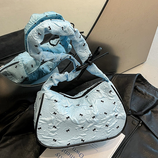 Damen Umhängetasche mit innovativer Schulterriemenstruktur und floralem Design Nord Taschen