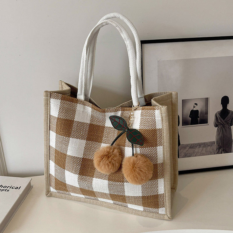 Damen Shopper-Tasche mit kariertem Design und verspielten Pompons Nord Taschen