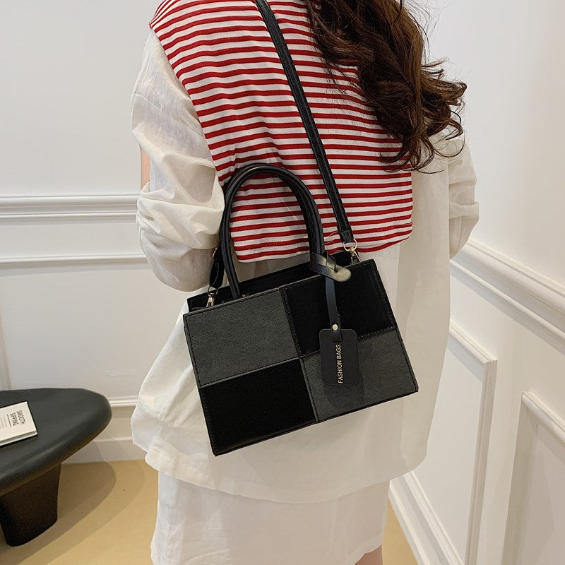 Damen elegante Handtasche mit strukturiertem Patchwork-Design Nord Taschen