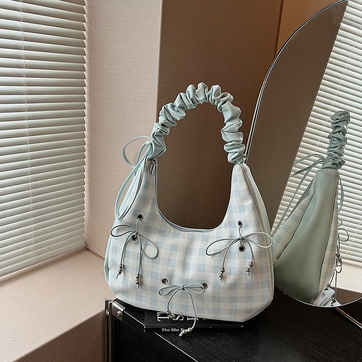 Damen Hobo-Tasche mit dekorativem Kordelzug und glänzenden Akzenten Nord Taschen