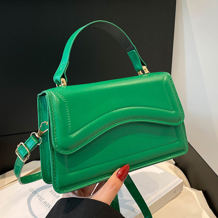 Damen elegante Handtasche mit geschwungenem Design Nord Taschen