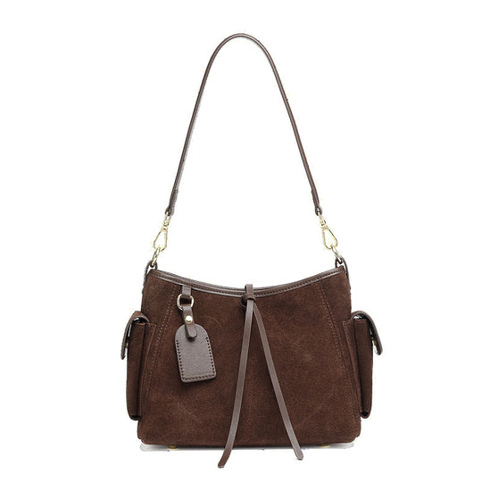 Damen Schultertasche aus feinem Wildleder mit praktischen Außentaschen Nord Taschen