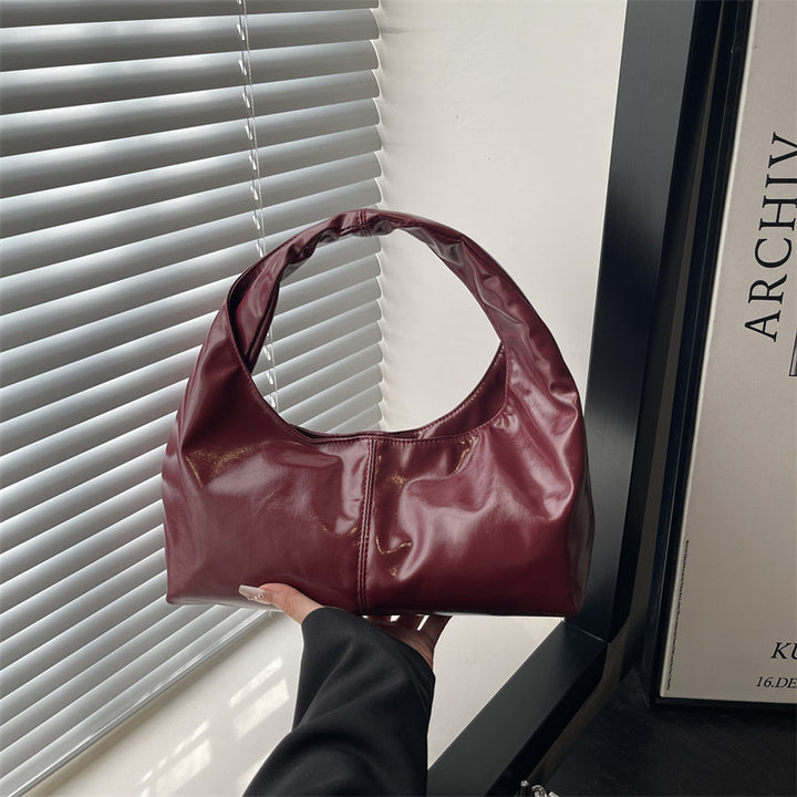 Damen Hobo-Tasche aus glänzendem Kunstleder mit elegantem Tragegriff Nord Taschen