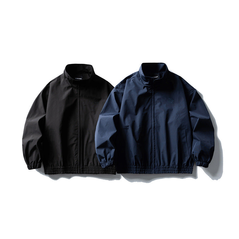 Herren Windbreaker-Jacke im Boxy‑Schnitt mit Stehkragen und elastischem Saum Nord Taschen