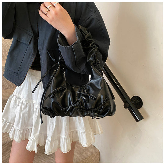 Damen Handtasche mit raffinierten Schleifen-Details und elegantem Tragegriff Nord Taschen