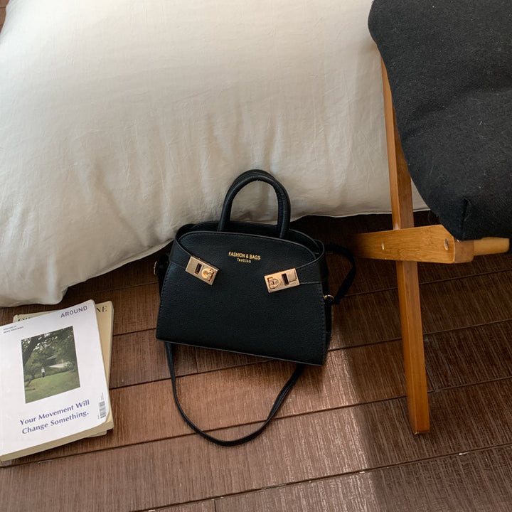 Damen elegante Handtasche mit verspieltem Verschluss Nord Taschen