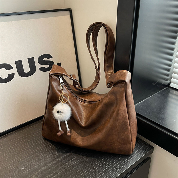 Damen Handtasche mit verspieltem Schlüsselanhänger Nord Taschen