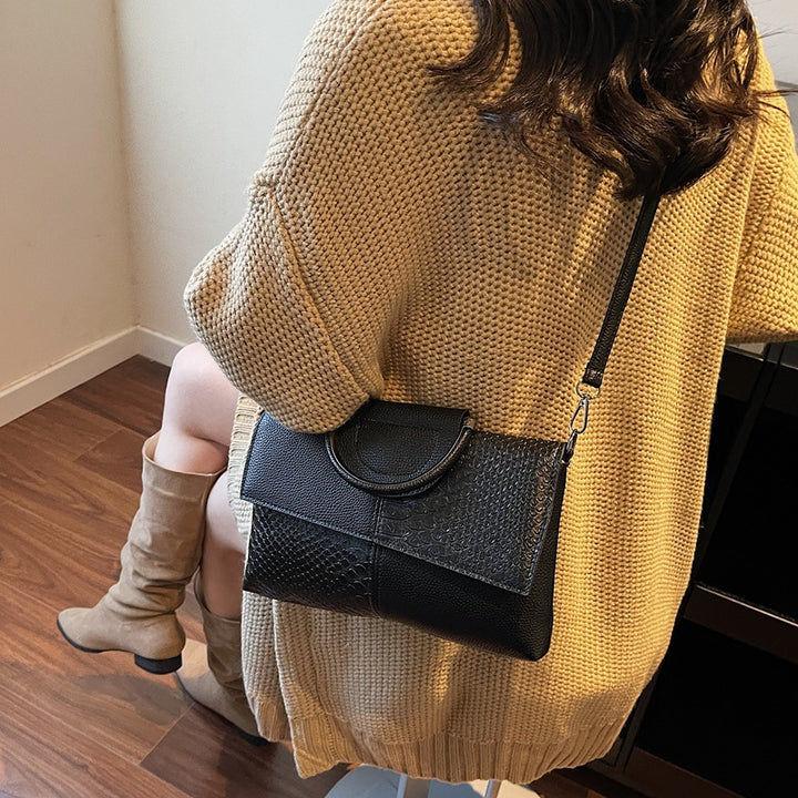 Damen elegante Umhängetasche im modernen Schlangenleder-Look Nord Taschen