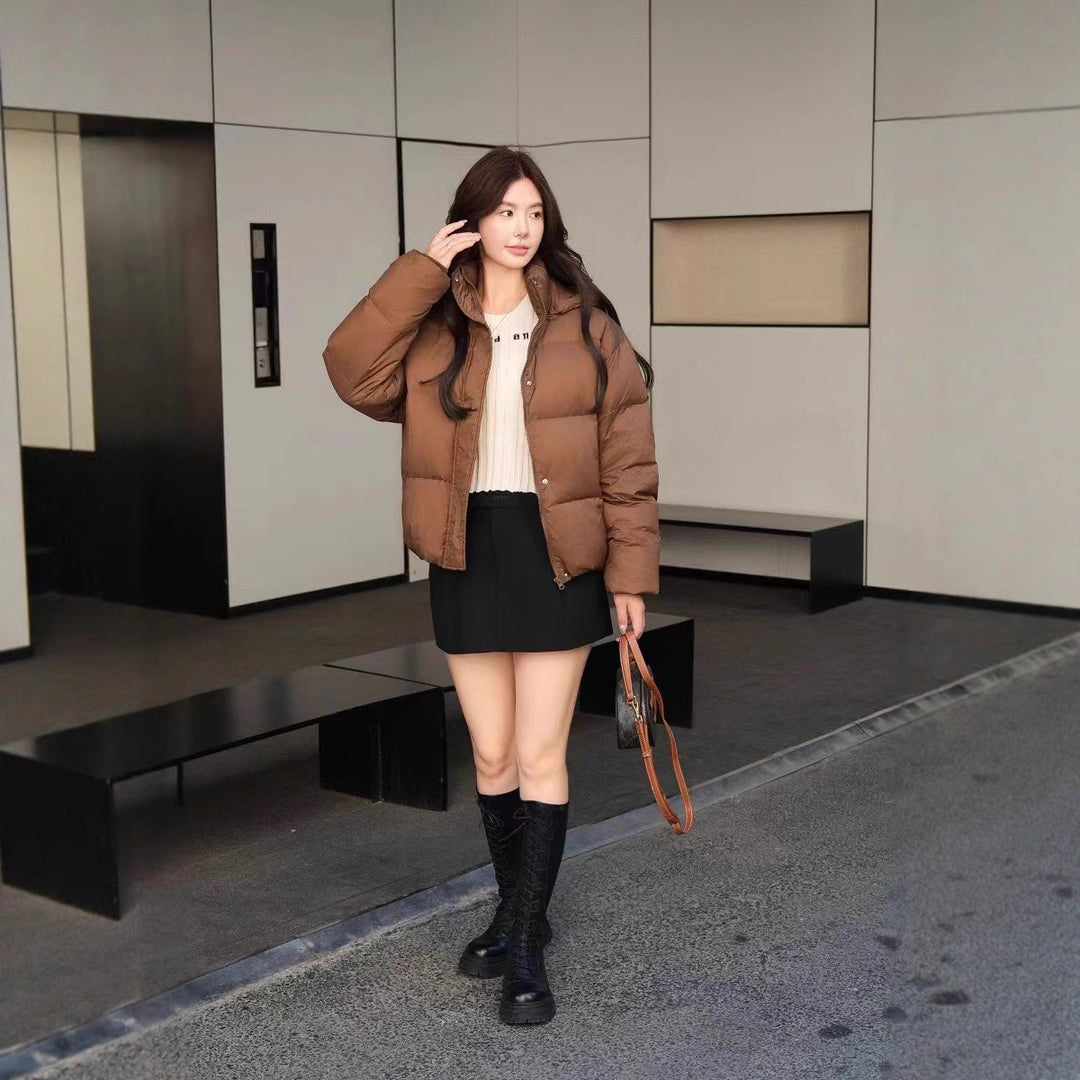 Damen Kurz geschnittene Oversize-Steppjacke mit XXL-Kapuze und thermischer Isolierung Nord Taschen