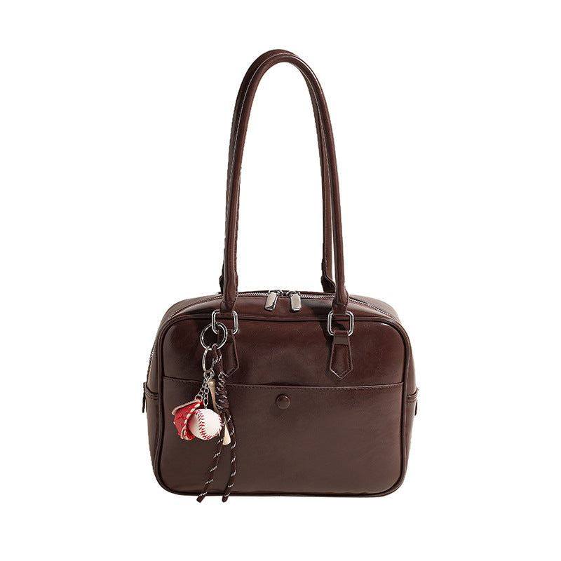 Damen praktische Lederhandtasche mit charmantem Anhänger Nord Taschen