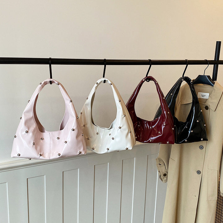 Damen glänzende Handtasche mit strukturiertem Design Nord Taschen