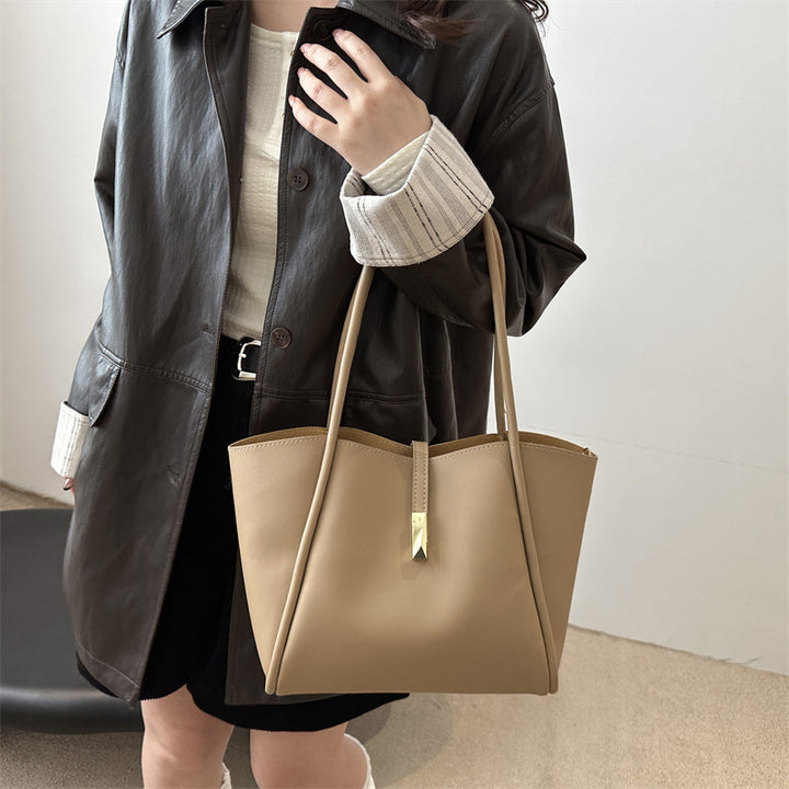 Damen elegante Tragetasche mit goldenen Akzenten Nord Taschen