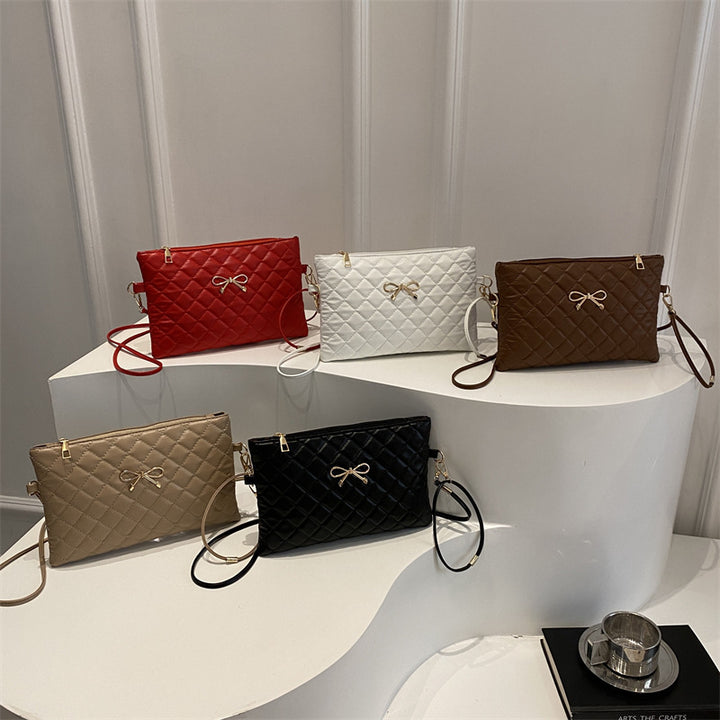Damen elegante Clutch mit elegantem Steppmuster und zierlichem Schleifenakzent Nord Taschen