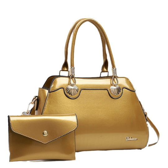 Damen Handtasche mit eleganten Goldakzenten und abnehmbarer Mini-Clutch Nord Taschen