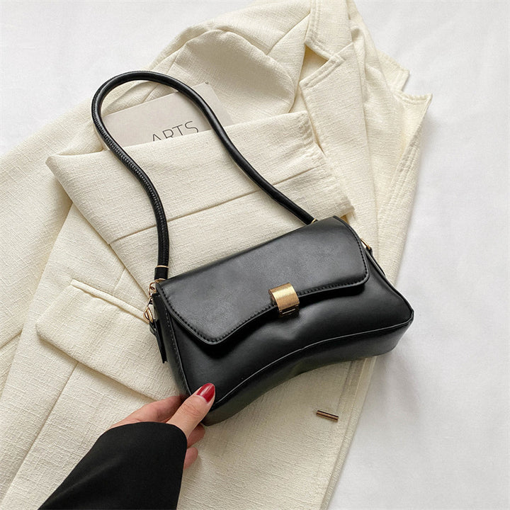 Damen elegante Umhängetasche mit goldener Verschlussmechanik Nord Taschen