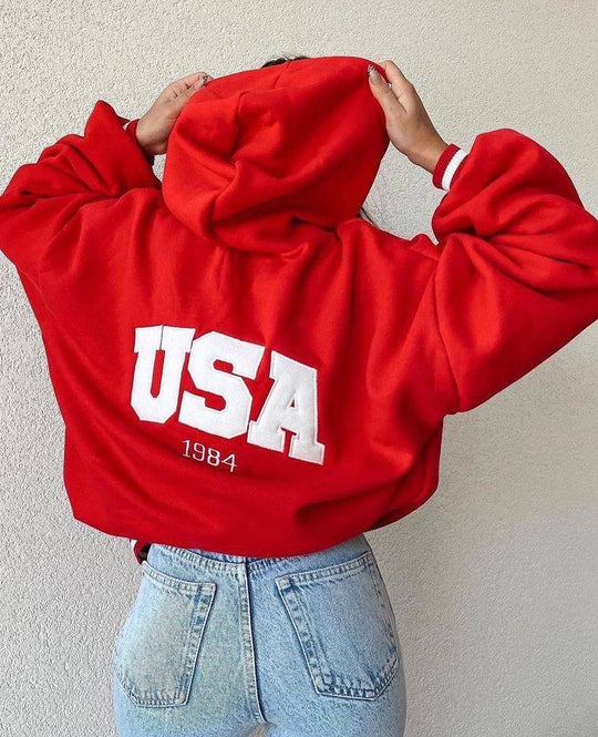 Damen Kurz geschnittener Oversize-Kapuzenpullover mit aufgenähter College-Applikation und gerippten Bündchen Nord Taschen