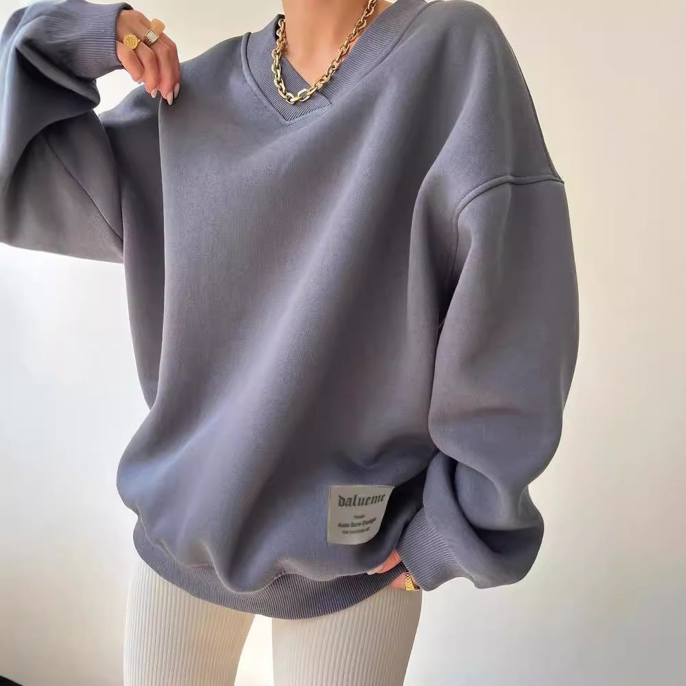 Damen Oversized Sweatshirt mit V-Ausschnitt und geripptem Kragen Nord Taschen