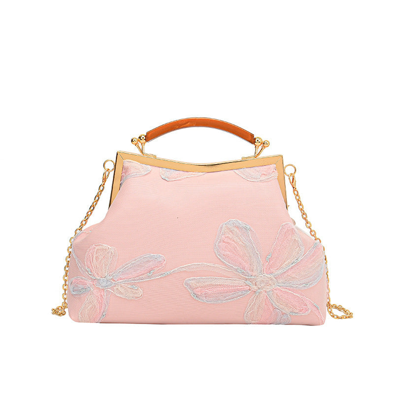 Damen Handtasche mit floralem Muster und elegantem Kettenakkzent Nord Taschen
