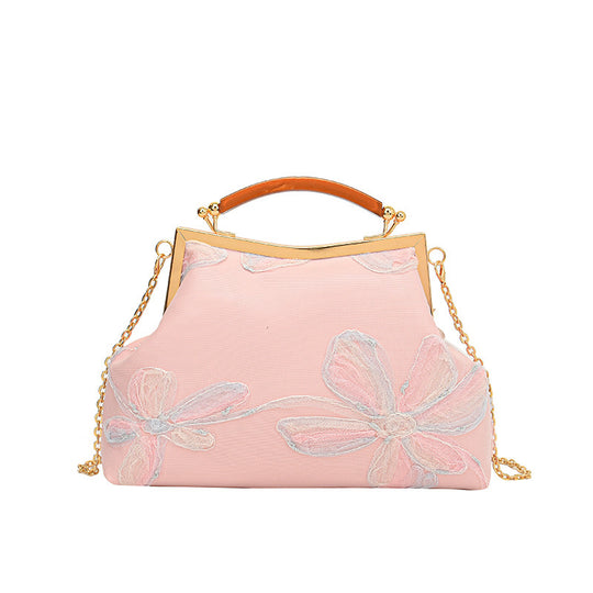 Damen Handtasche mit floralem Muster und elegantem Kettenakkzent Nord Taschen