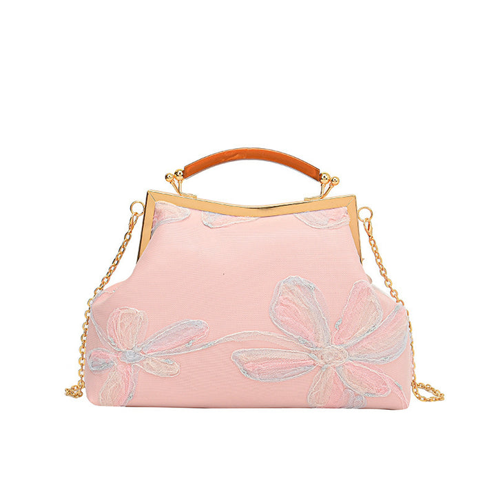Damen Handtasche mit floralem Muster und elegantem Kettenakkzent Nord Taschen