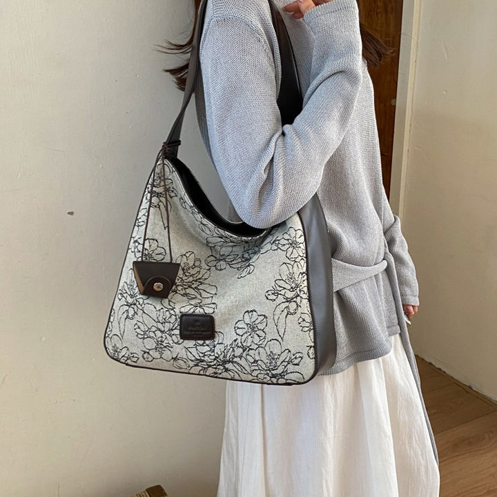 Damen Beuteltasche mit floralem Motiv und weichem Tragegriff Nord Taschen