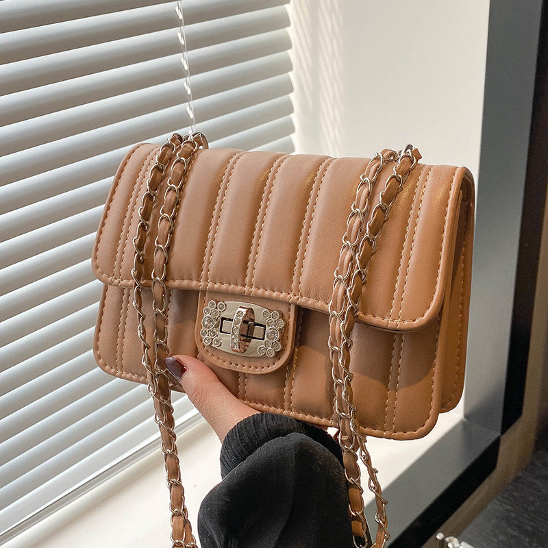 Damen Umhängetasche mit gestepptem Design und elegantem Verschluss Nord Taschen