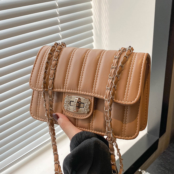 Damen Umhängetasche mit gestepptem Design und elegantem Verschluss Nord Taschen