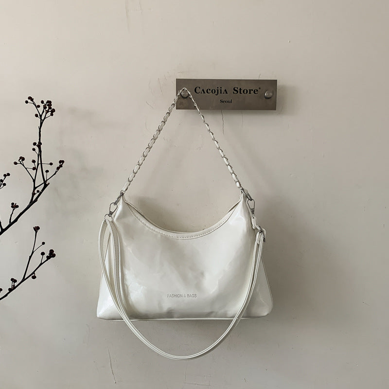 Damen Umhängetasche mit luxuriösem, poliertem Kunstleder und vielseitigem Tragegurt Nord Taschen