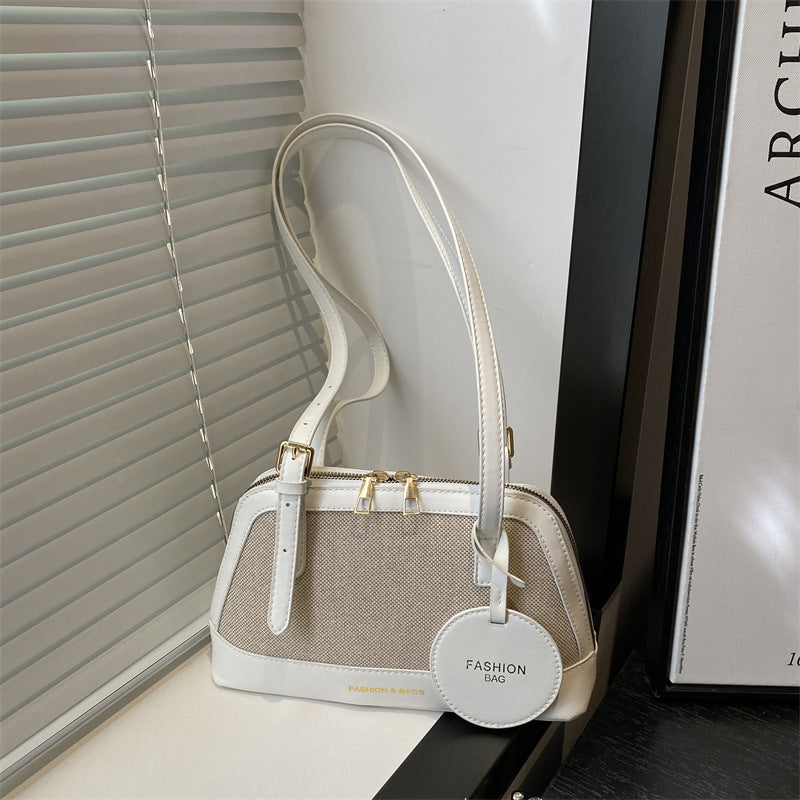 Damen Umhängetasche mit strukturiertem Gewebe und elegantem Detail Nord Taschen