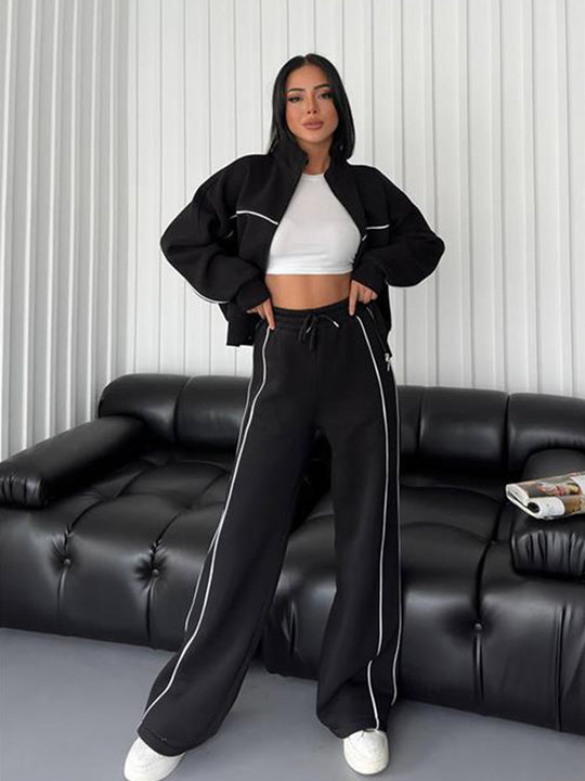 Damen lässiges Sweatset mit Stehkragen Reißverschluss gekürzter Jacke und hochtaillierter Schlaghose Nord Taschen