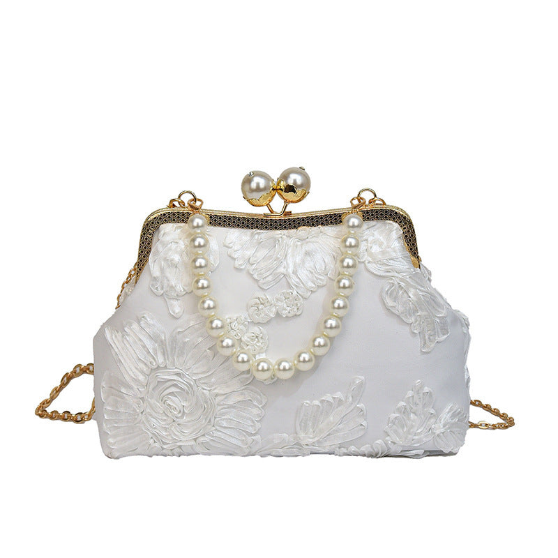 Damen elegante Clutch mit floralen Stickereien und Perlenakzenten Nord Taschen