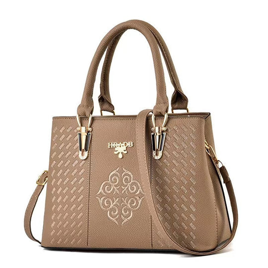 Damen elegante Handtasche mit aufwendigem gewebtem Design und kontrastierender Verzierung Nord Taschen