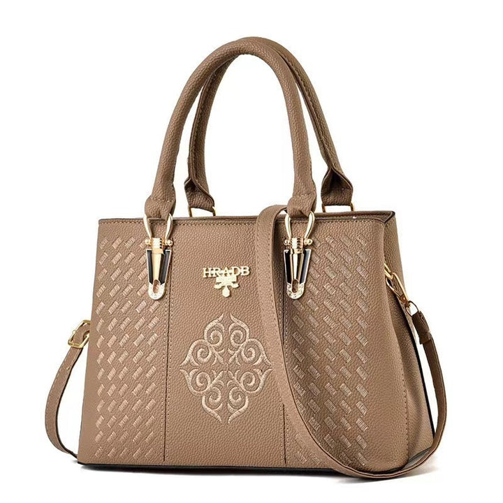 Damen elegante Handtasche mit aufwendigem gewebtem Design und kontrastierender Verzierung Nord Taschen