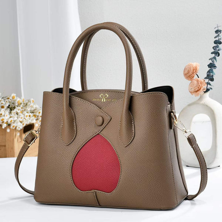 Damen elegante Handtasche mit einzigartiger Herz-Applikation Nord Taschen