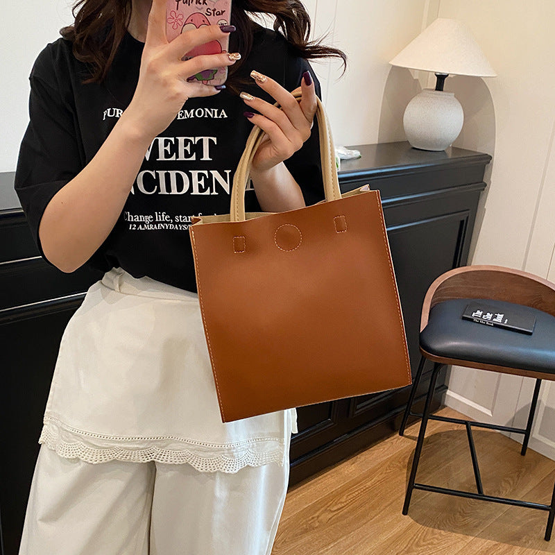 Damen elegante Handtasche mit strukturiertem Design und abnehmbaren Tragehenkeln Nord Taschen