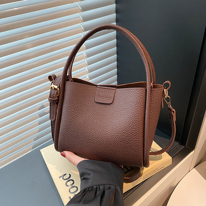 Damen Handtasche mit strukturiertem Kunstleder und elegantem Innenfach Nord Taschen